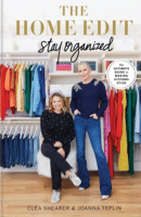 Book cover with two women standing in front of a clothing closet